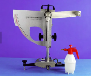 British pendulum slip resistance tester with water spray bottle used for wet flooring tests