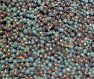Close-up of two-tone light and dark blue PolySoft polyolefin beads